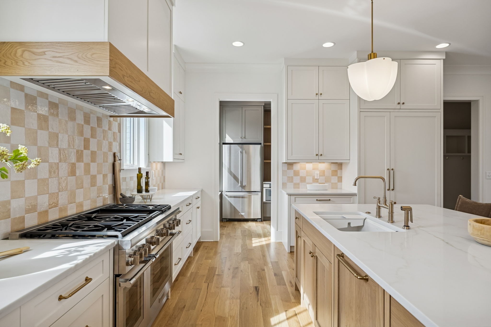 3510 Robin Road Nashville, TN 37204 - Photo 15 of 78 a kitchen with a stove a sink and a refrigerator