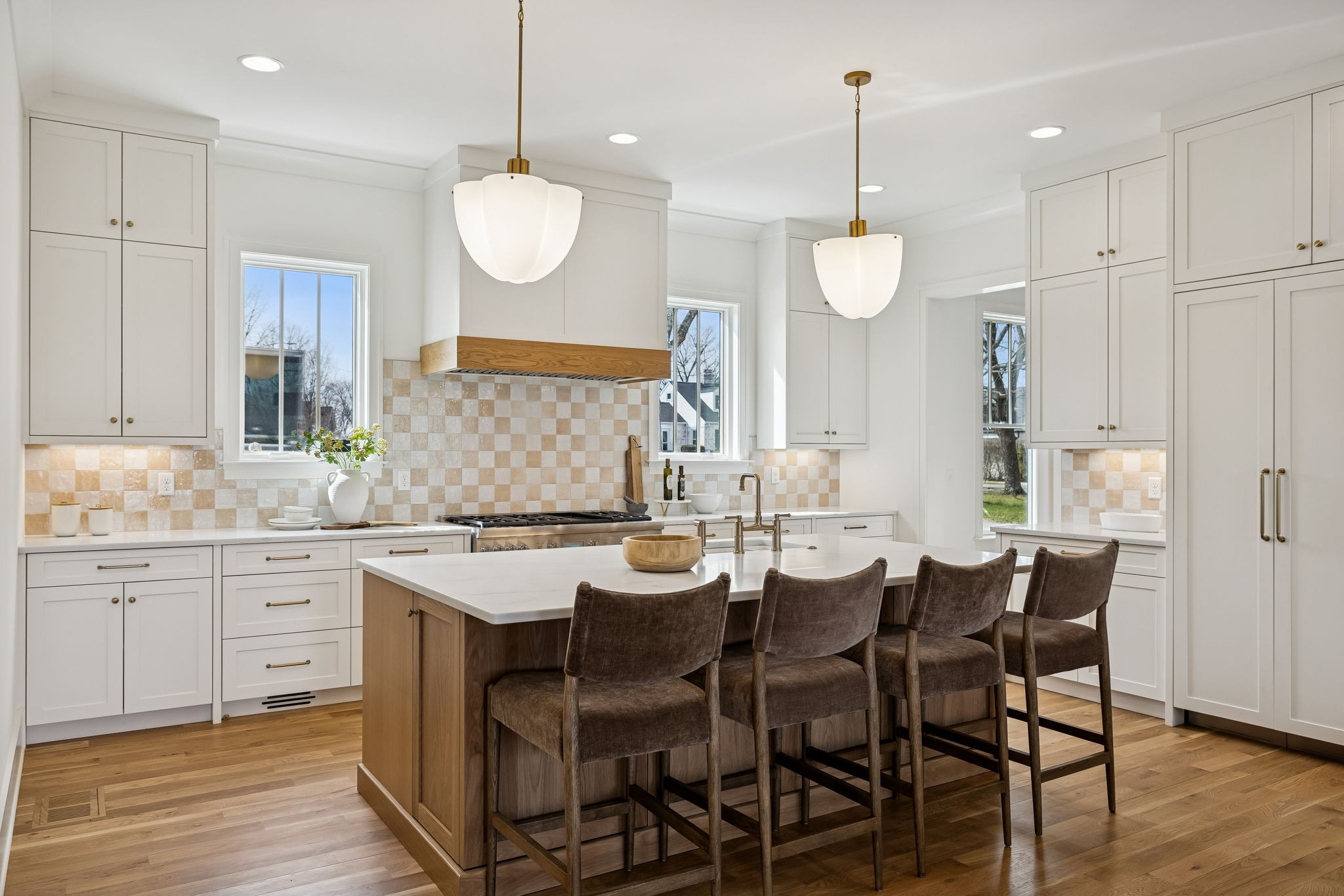 3510 Robin Road Nashville, TN 37204 - Photo 16 of 78 a kitchen with center island table and chairs in it