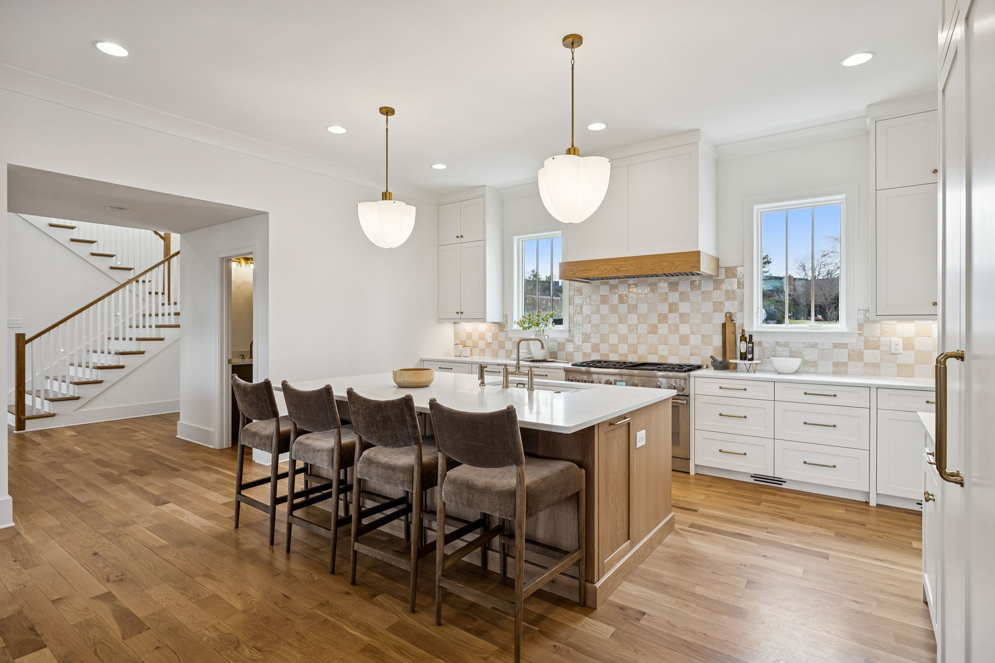3510 Robin Road Nashville, TN 37204 - Photo 17 of 78 a large kitchen with white cabinets and wooden floor