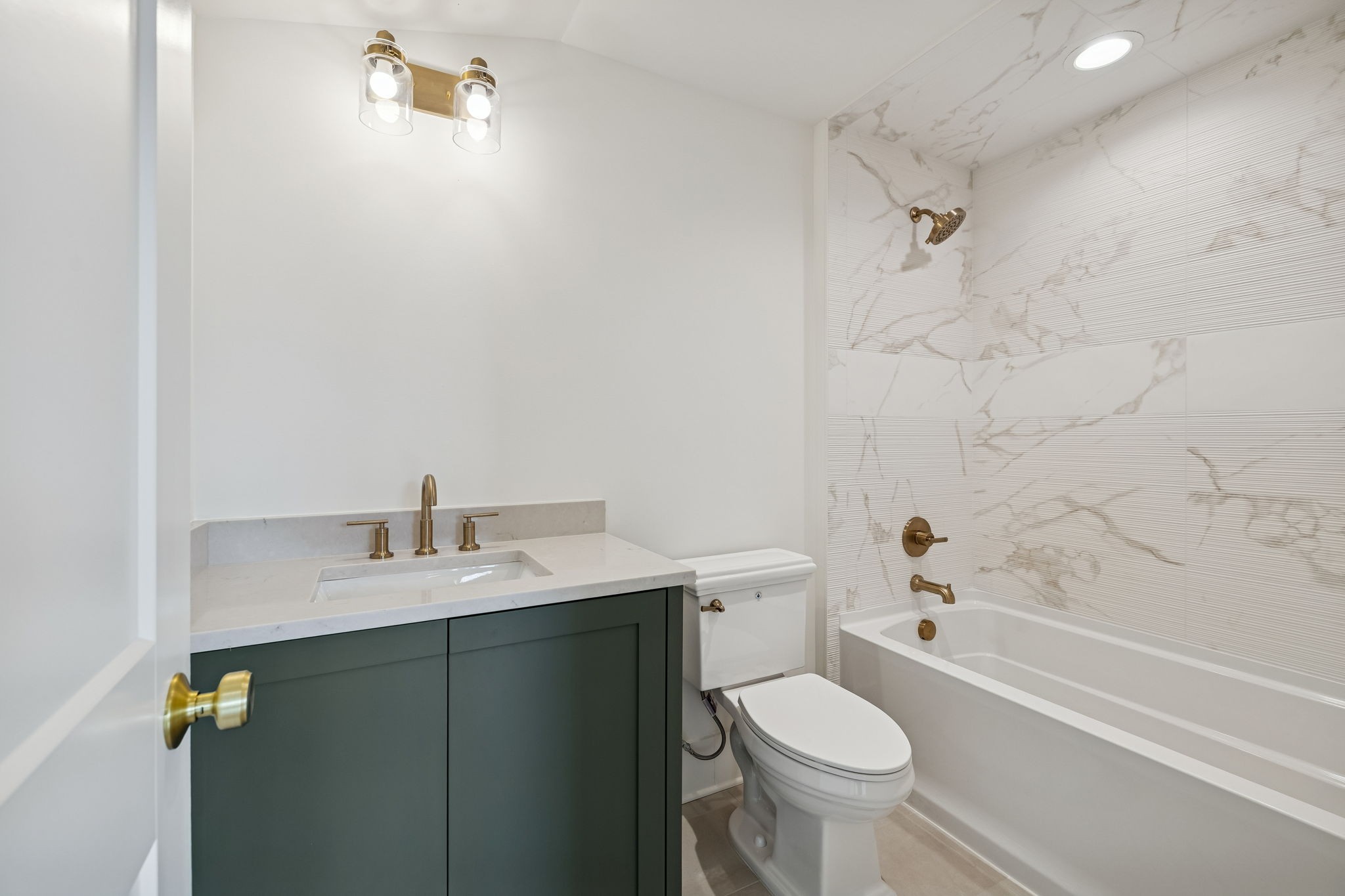 3510 Robin Road Nashville, TN 37204 - Photo 49 of 78 a bathroom with a granite countertop sink a toilet and shower