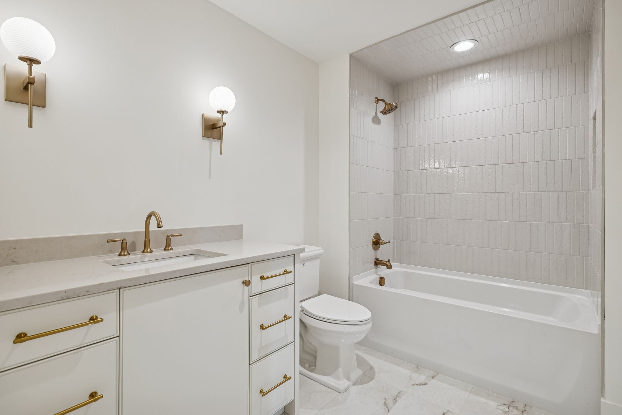 3510 Robin Road Nashville, TN 37204 - Photo 56 of 78 a bathroom with a granite countertop sink a toilet and shower