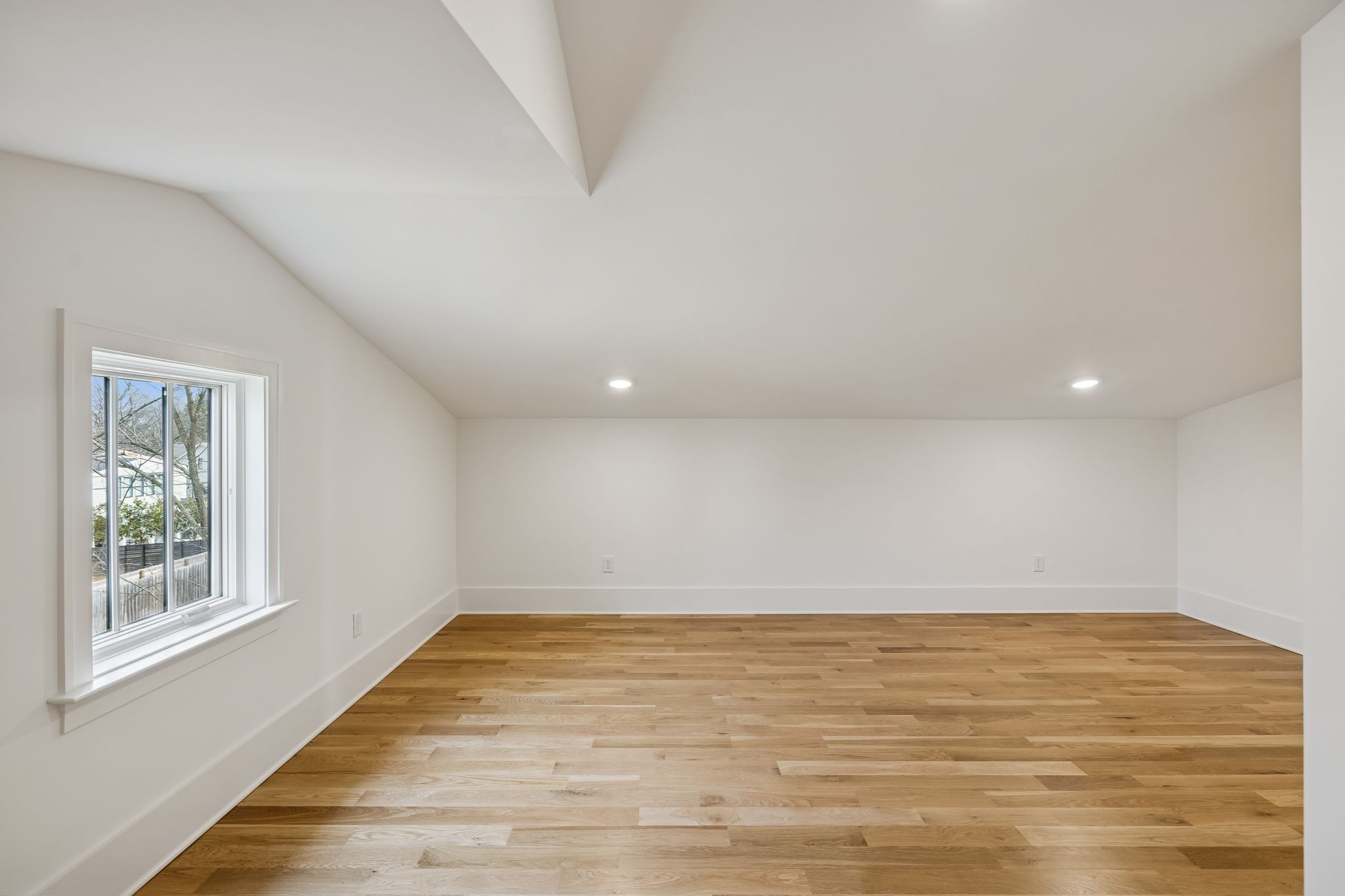 3510 Robin Road Nashville, TN 37204 - Photo 64 of 78 a view of an empty room with wooden floor and a window