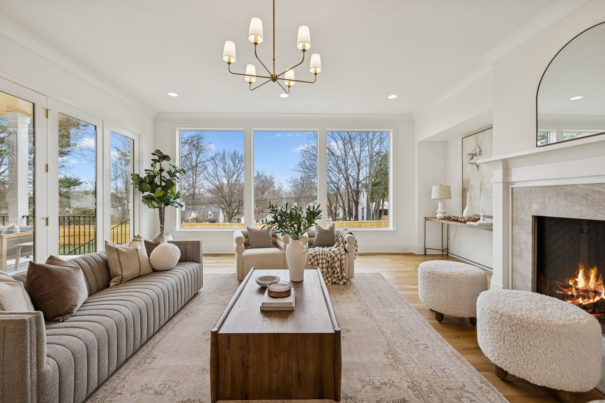 3510 Robin Road Nashville, TN 37204 - Photo 7 of 78 a living room with furniture a large window and a fireplace