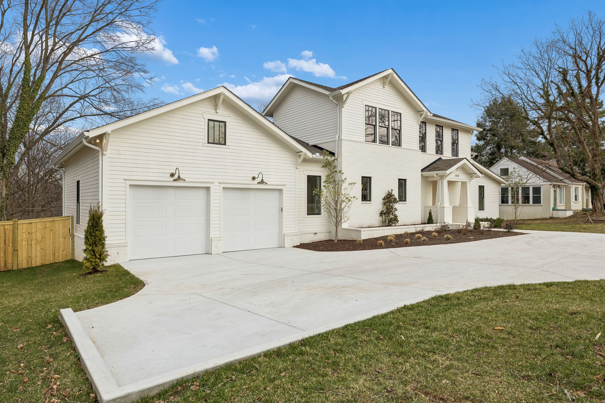 3510 Robin Road Nashville, TN 37204 - Photo 75 of 78 a view of a house with a yard and garage