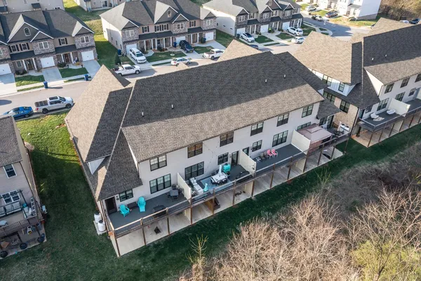a bedroom with furniture and baby crib