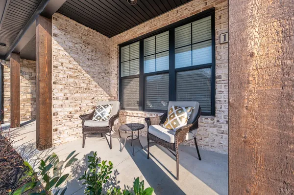 a bathroom with a shower a toilet and sink