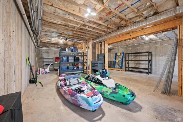 an aerial view of a house with swimming pool and sitting space