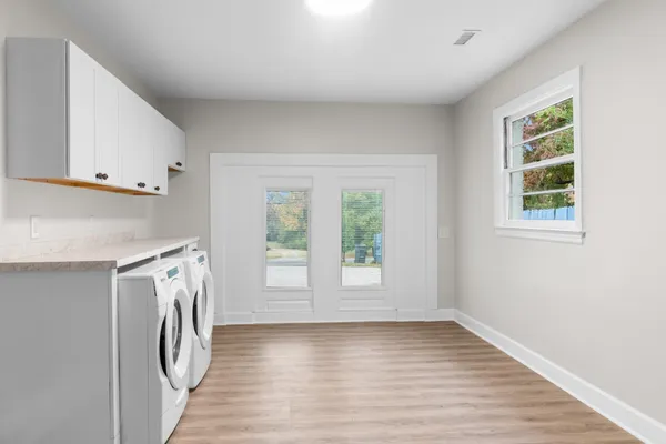 a living room with furniture and a window