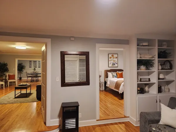 a living room with a fireplace and a fireplace