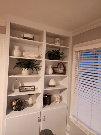 a close view of a utility room with washer and dryer