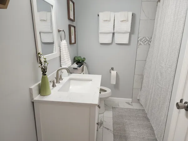 a backyard of a house with lots of green space