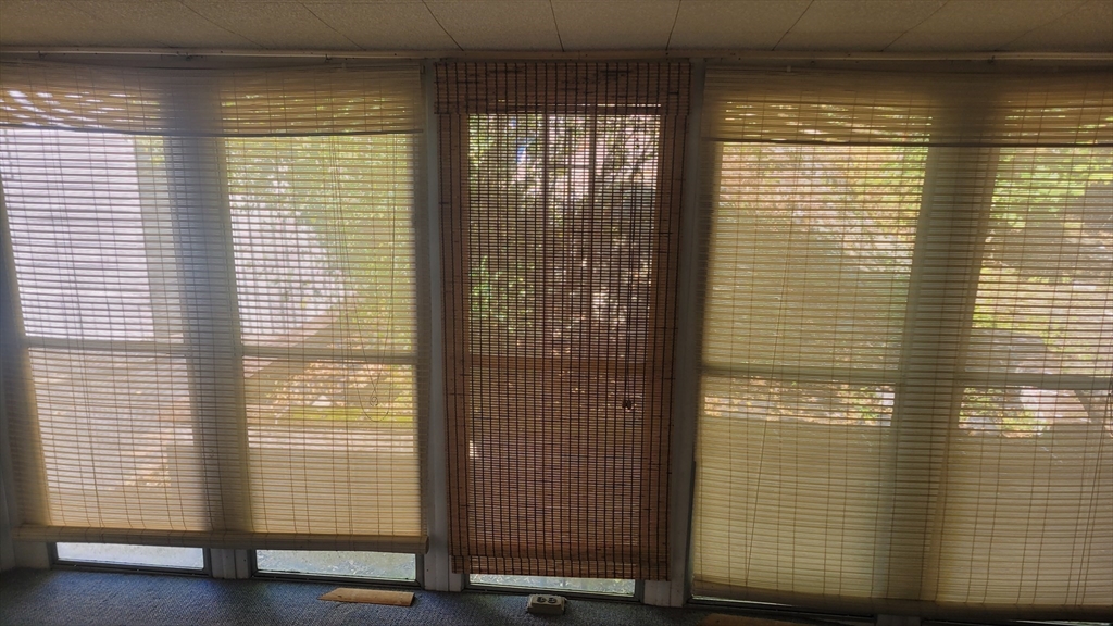 846 Broadway, Unit 40 Saugus, MA 01906 - Photo 13 of 13 a view of a bathroom with a glass door