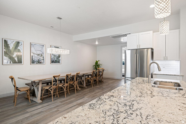4281 Canterbury Road Hurricane, UT 84737 - Photo 5 of 24 Contemporary kitchen island with a stone countertop and undermount stainless steel sink