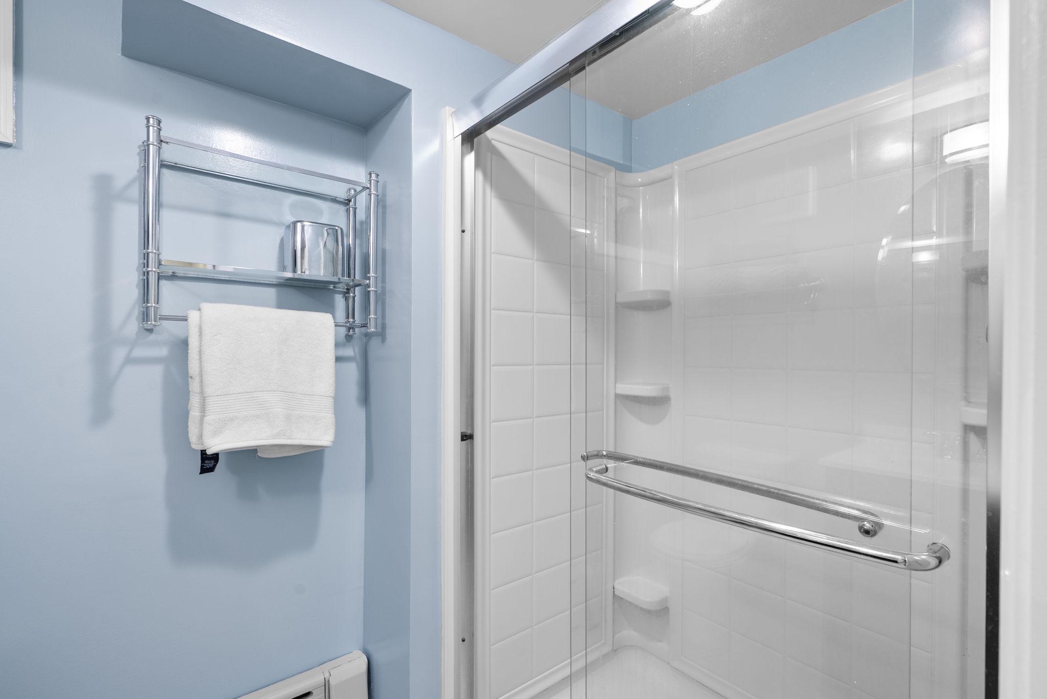 713 Gist Avenue Silver Spring, MD 20910 - Photo 24 of 35 a bathroom with a shower and a mirror