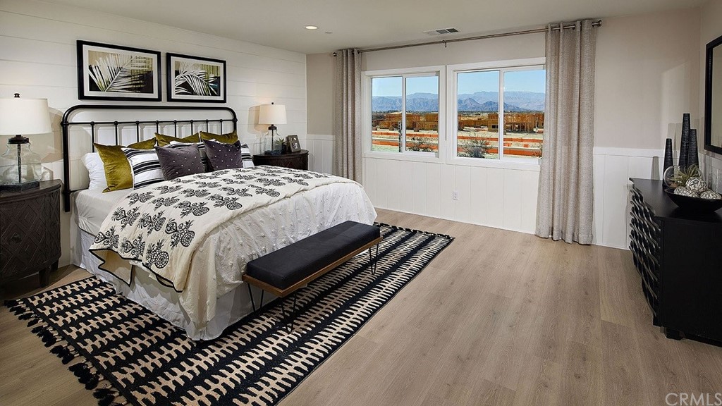 44324 Beringer Drive Indio, CA 92203 - Photo 11 of 14 a bedroom with a bed next to a window with outer view