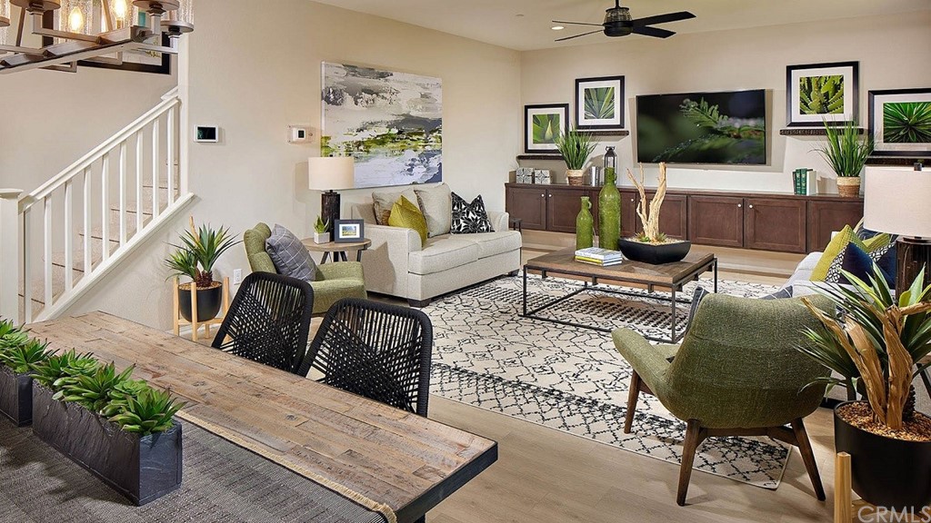 44324 Beringer Drive Indio, CA 92203 - Photo 5 of 14 a living room with furniture and a flat screen tv