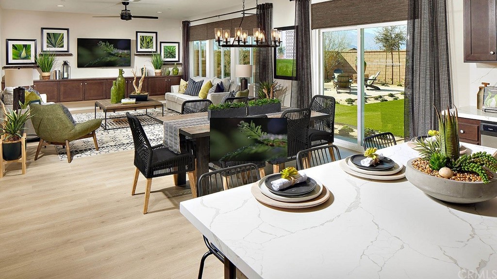 44324 Beringer Drive Indio, CA 92203 - Photo 8 of 14 a view of a dining room with furniture window and outside view