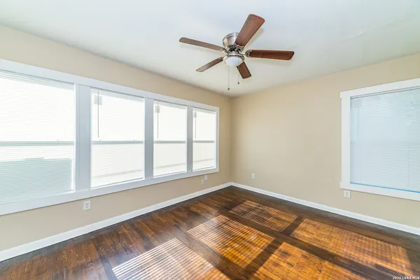 a view of a room that has a window in it