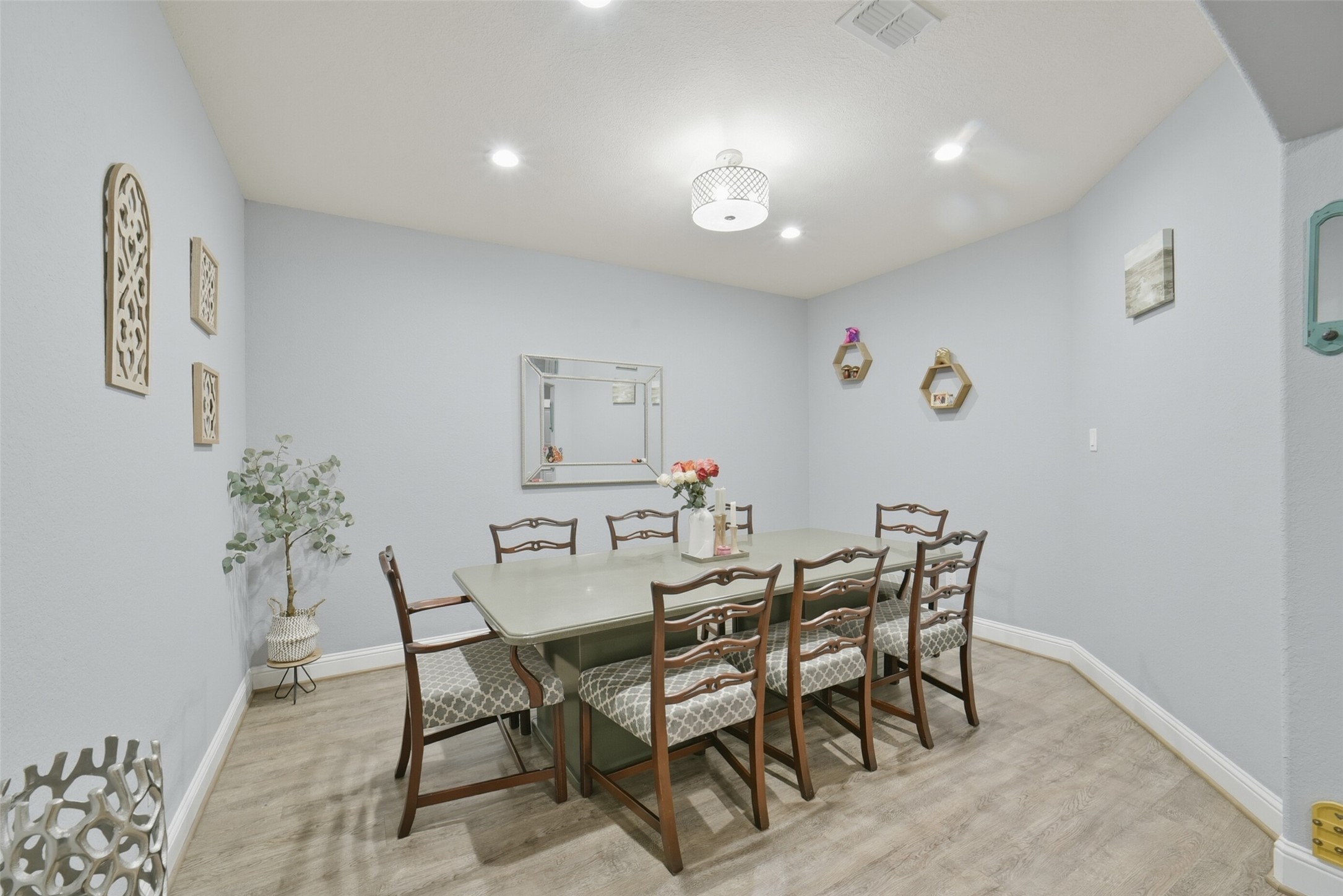 30014 Valley Terrace Drive Fulshear, TX 77406 - Photo 7 of 36 As you walk further down the foyer you will see the formal dining room which features LED recessed lighting, tall ceilings and an updated light fixture.