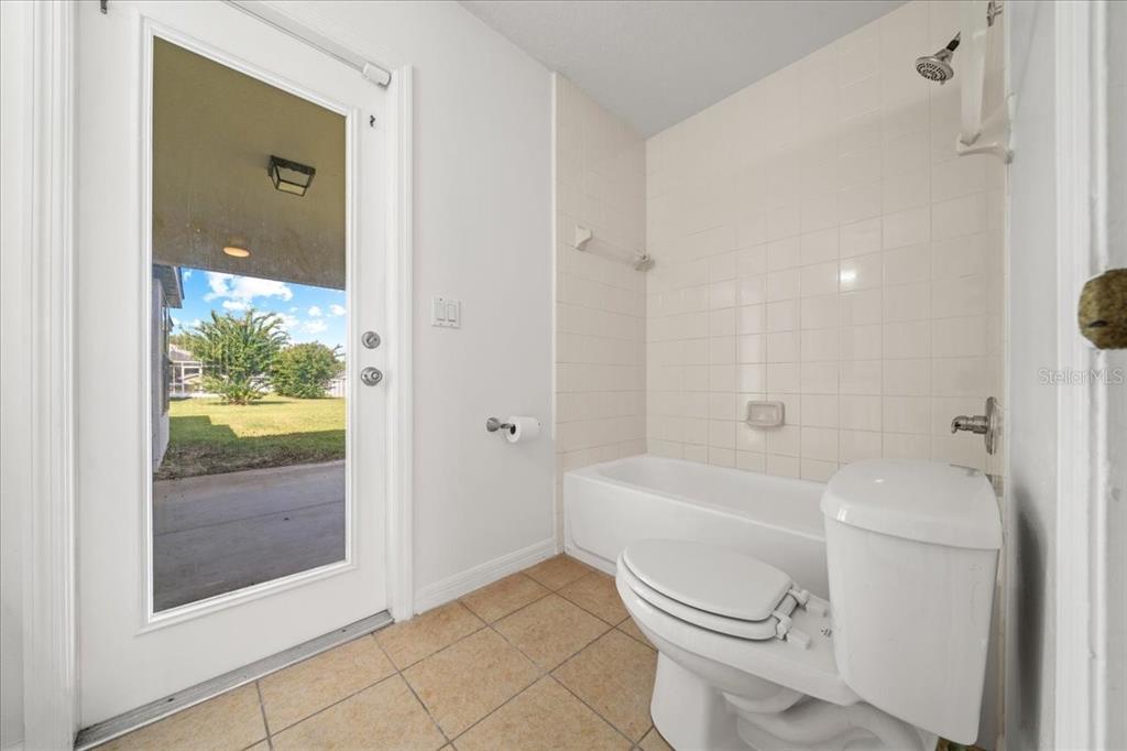 5659 Southwest 89th Place Ocala, FL 34476 - Photo 37 of 76 a bathroom with a toilet and a shower