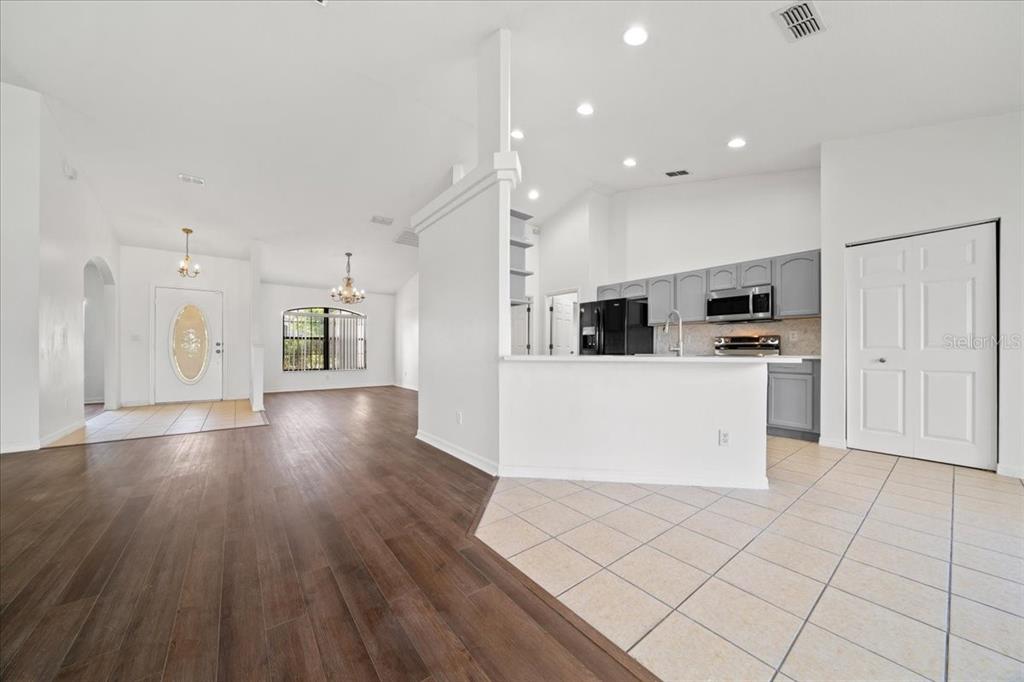 5659 Southwest 89th Place Ocala, FL 34476 - Photo 40 of 76 a view of a kitchen with microwave and cabinets