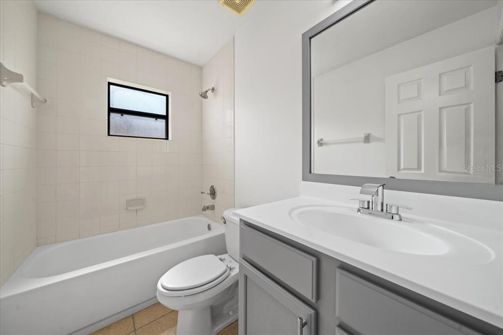 5659 Southwest 89th Place Ocala, FL 34476 - Photo 44 of 76 a bathroom with a sink a toilet and a bathtub