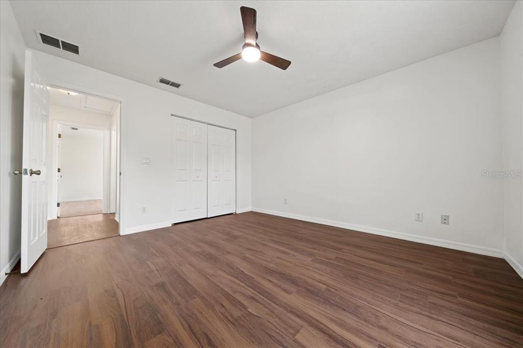 5659 Southwest 89th Place Ocala, FL 34476 - Photo 46 of 76 a view of empty room with wooden floor