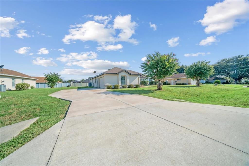 5659 Southwest 89th Place Ocala, FL 34476 - Photo 62 of 76 a view of backyard with garden and entertaining space