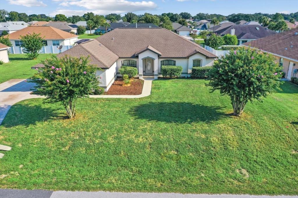 5659 Southwest 89th Place Ocala, FL 34476 - Photo 73 of 76 a view of house with garden space and street view