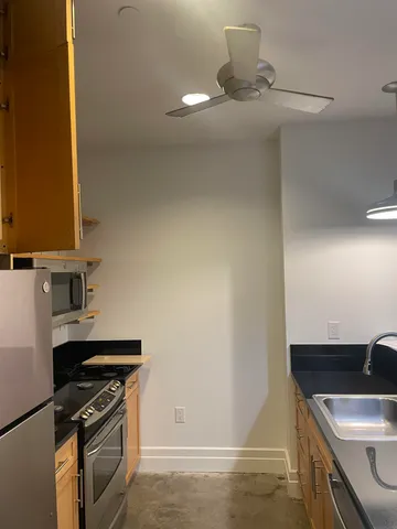 a bathroom with a sink a mirror and a bathtub