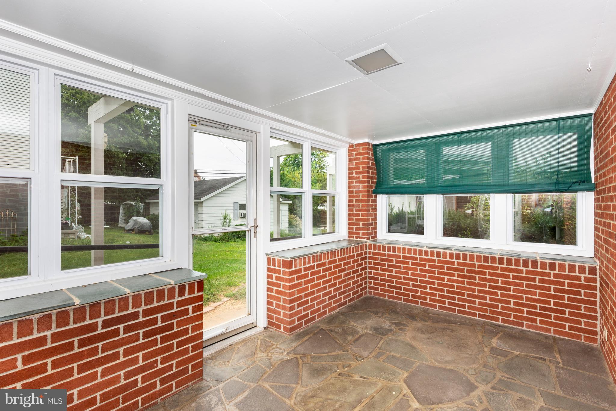 101 Blue Ridge Avenue New Windsor, MD 21776 - Photo 21 of 38 Rear enclosed porch on lower level.