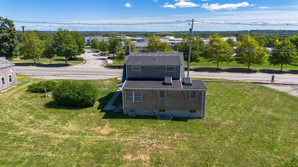 576 Faunce Corner Road Dartmouth, MA 02747 - Photo 11 of 19 a view of a backyard with outdoor space