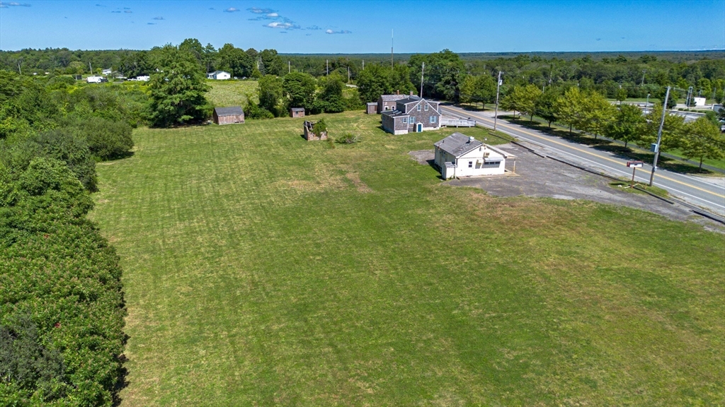 576 Faunce Corner Road Dartmouth, MA 02747 - Photo 18 of 19 an aerial view of a house with a yard and lake view