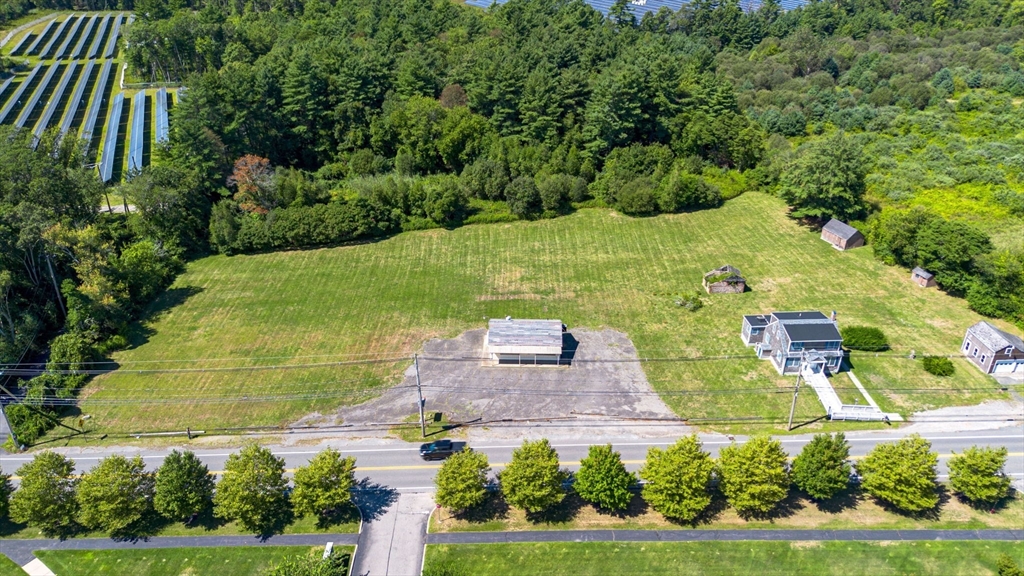 576 Faunce Corner Road Dartmouth, MA 02747 - Photo 19 of 19 an aerial view of a house with a yard basket ball court and outdoor seating