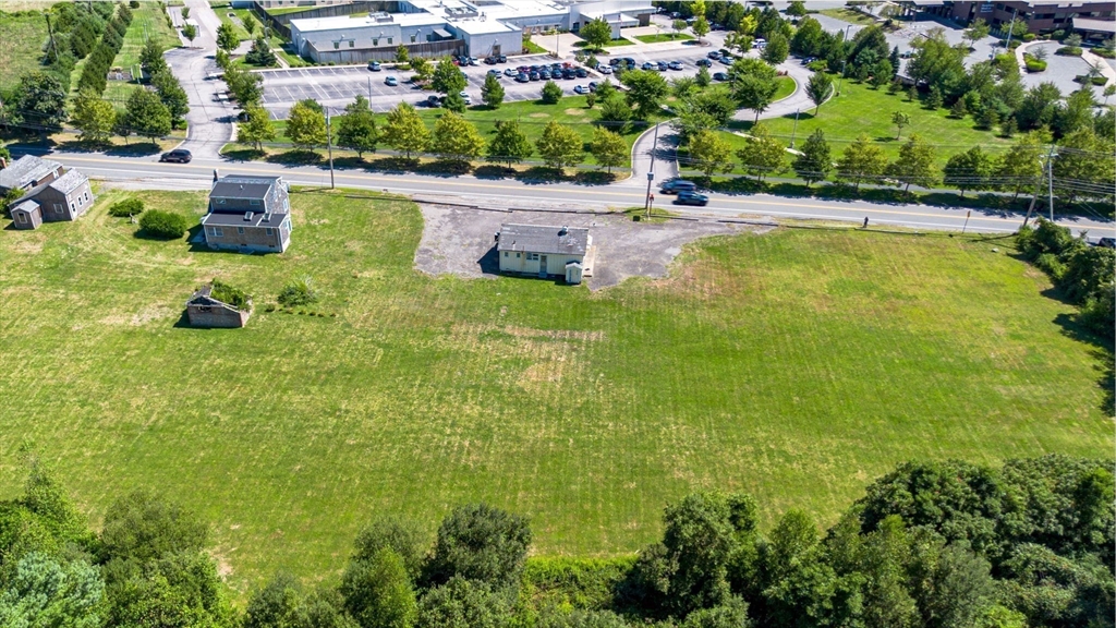 576 Faunce Corner Road Dartmouth, MA 02747 - Photo 3 of 19 a view of a swimming pool with lounge chair