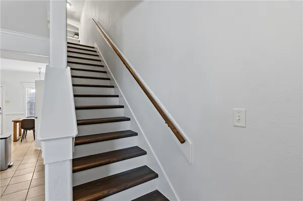 a view of entryway with wooden floor