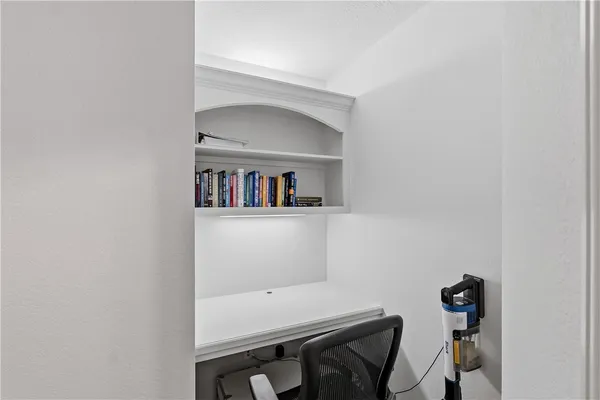 a view of a room with workspace