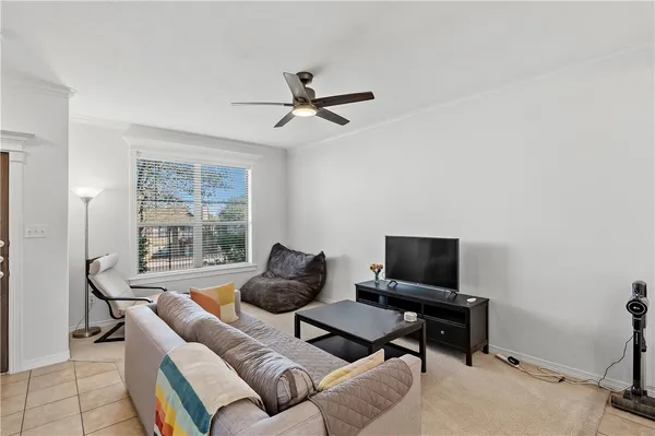 a living room with furniture and a window