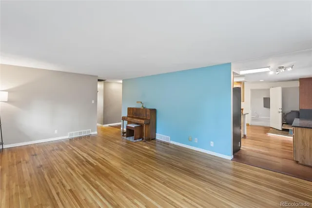 a view of livingroom with furniture and wooden floor