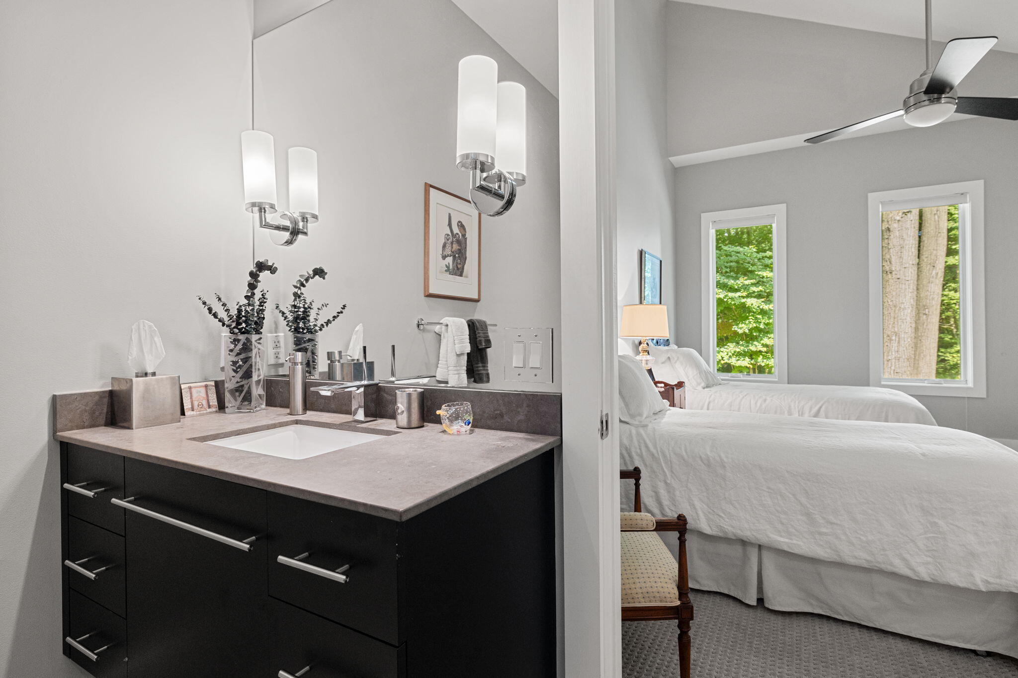 17138 River Bluff Drive, Unit 96 Union Pier, MI 49129 - Photo 39 of 89 a en suite bathroom with a sink and a mirror
