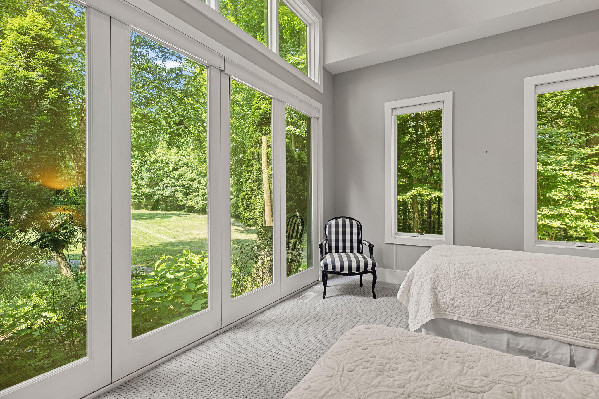 17138 River Bluff Drive, Unit 96 Union Pier, MI 49129 - Photo 45 of 89 a bedroom with a bed and a large window