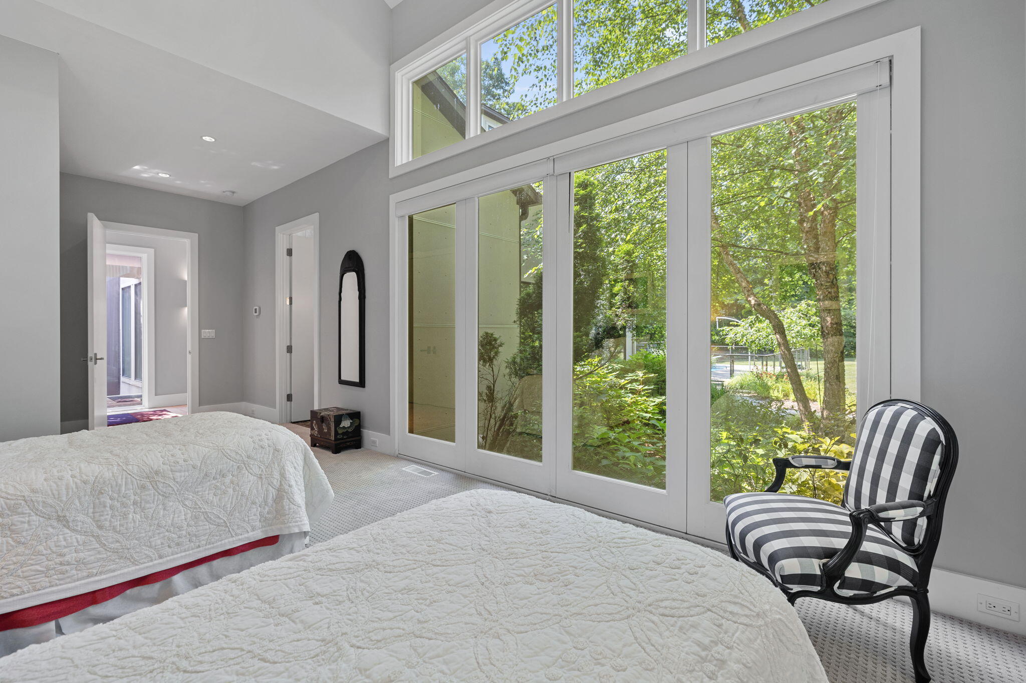 17138 River Bluff Drive, Unit 96 Union Pier, MI 49129 - Photo 46 of 89 a bedroom with a large bed and a large window