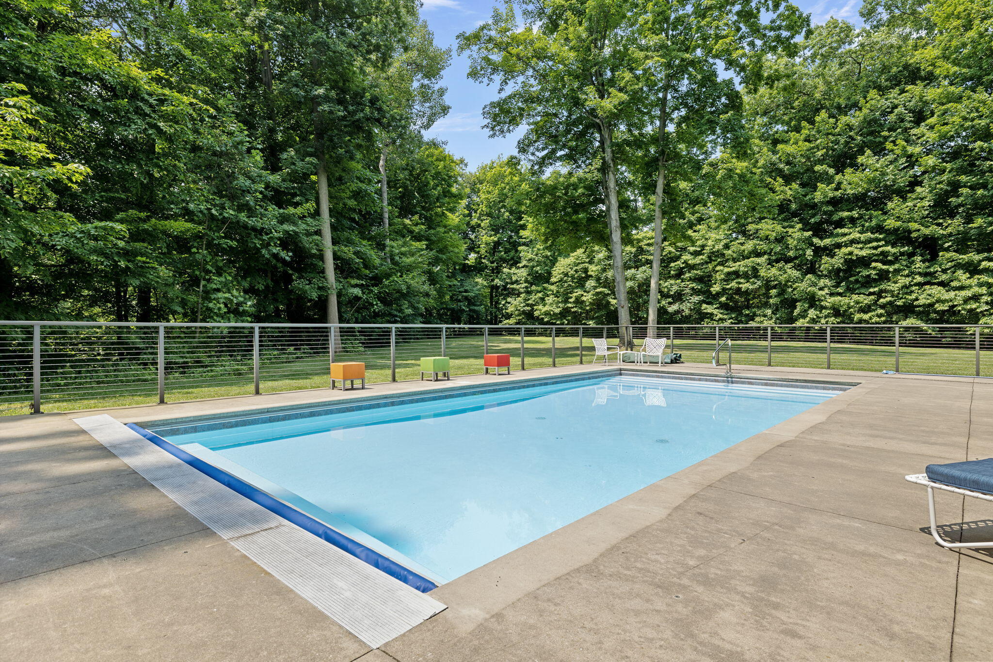 17138 River Bluff Drive, Unit 96 Union Pier, MI 49129 - Photo 73 of 89 a view of a tennis ground with large trees