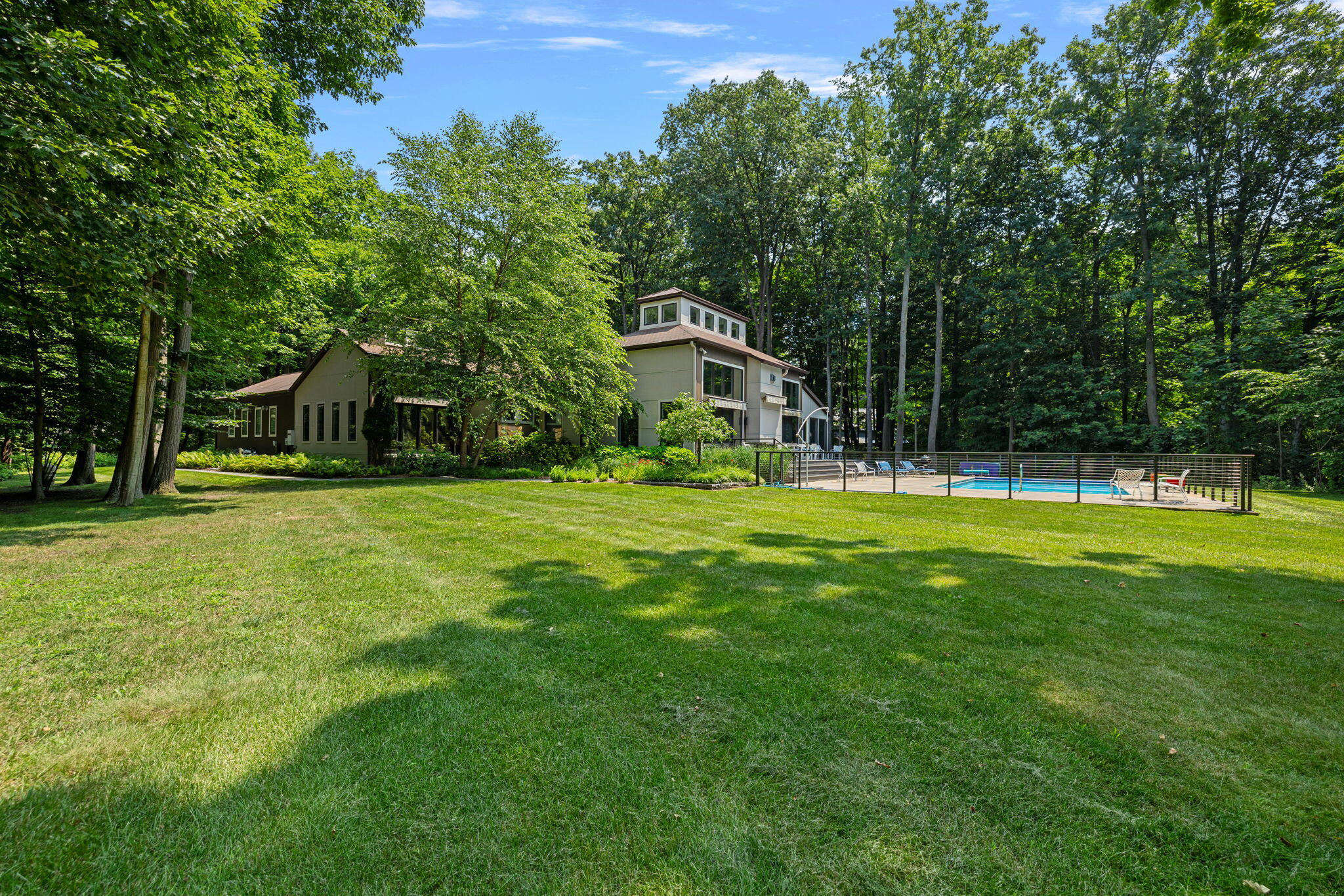 17138 River Bluff Drive, Unit 96 Union Pier, MI 49129 - Photo 77 of 89 a view of a house with a big yard