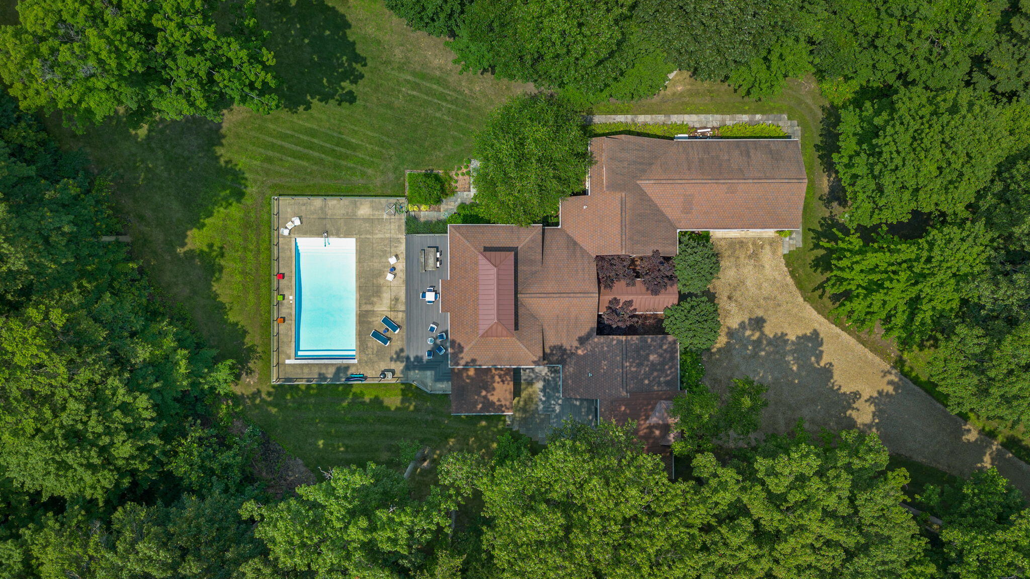 17138 River Bluff Drive, Unit 96 Union Pier, MI 49129 - Photo 84 of 89 an aerial view of a house with a yard and trees all around