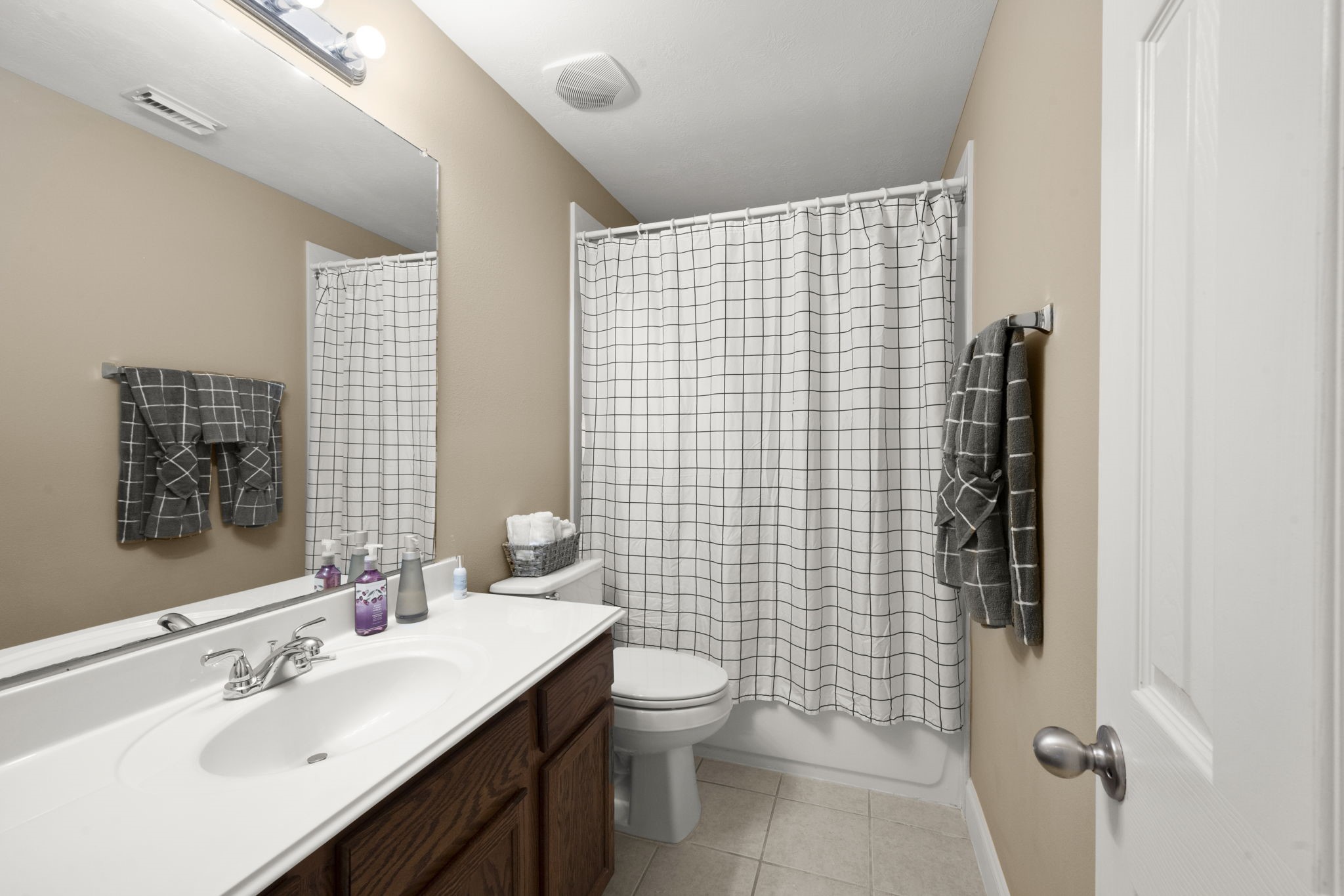 6315 Amelia Springs Drive Spring, TX 77379 - Photo 21 of 46 a bathroom with a sink toilet and shower