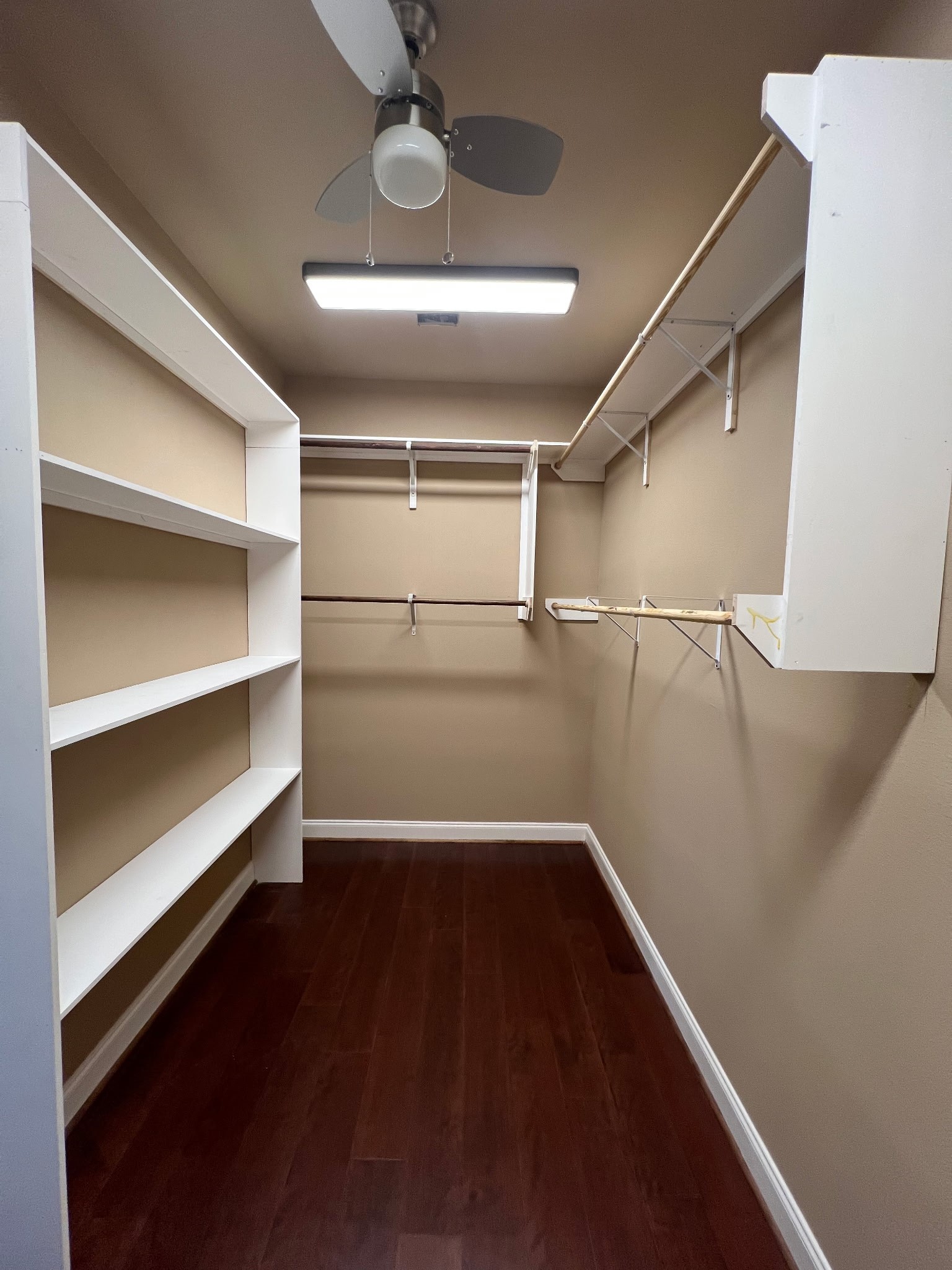 6315 Amelia Springs Drive Spring, TX 77379 - Photo 26 of 46 a view of storage and utility room with wooden floor