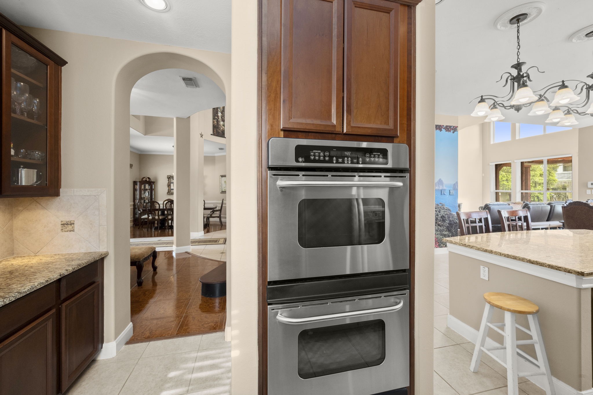 6315 Amelia Springs Drive Spring, TX 77379 - Photo 35 of 46 a kitchen with stainless steel appliances granite countertop a stove and a sink