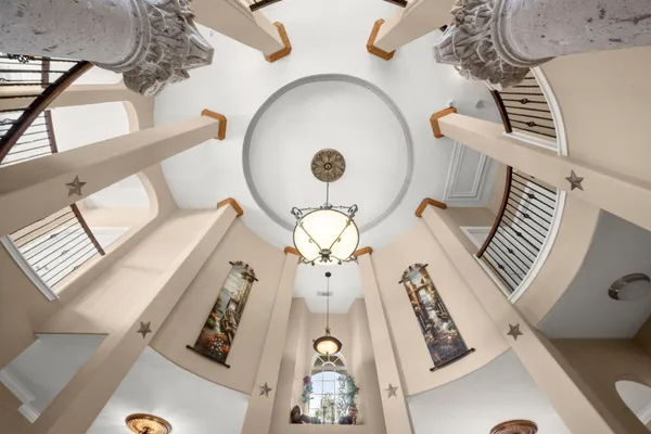 a kitchen with kitchen island granite countertop a sink counter top space appliances and cabinets