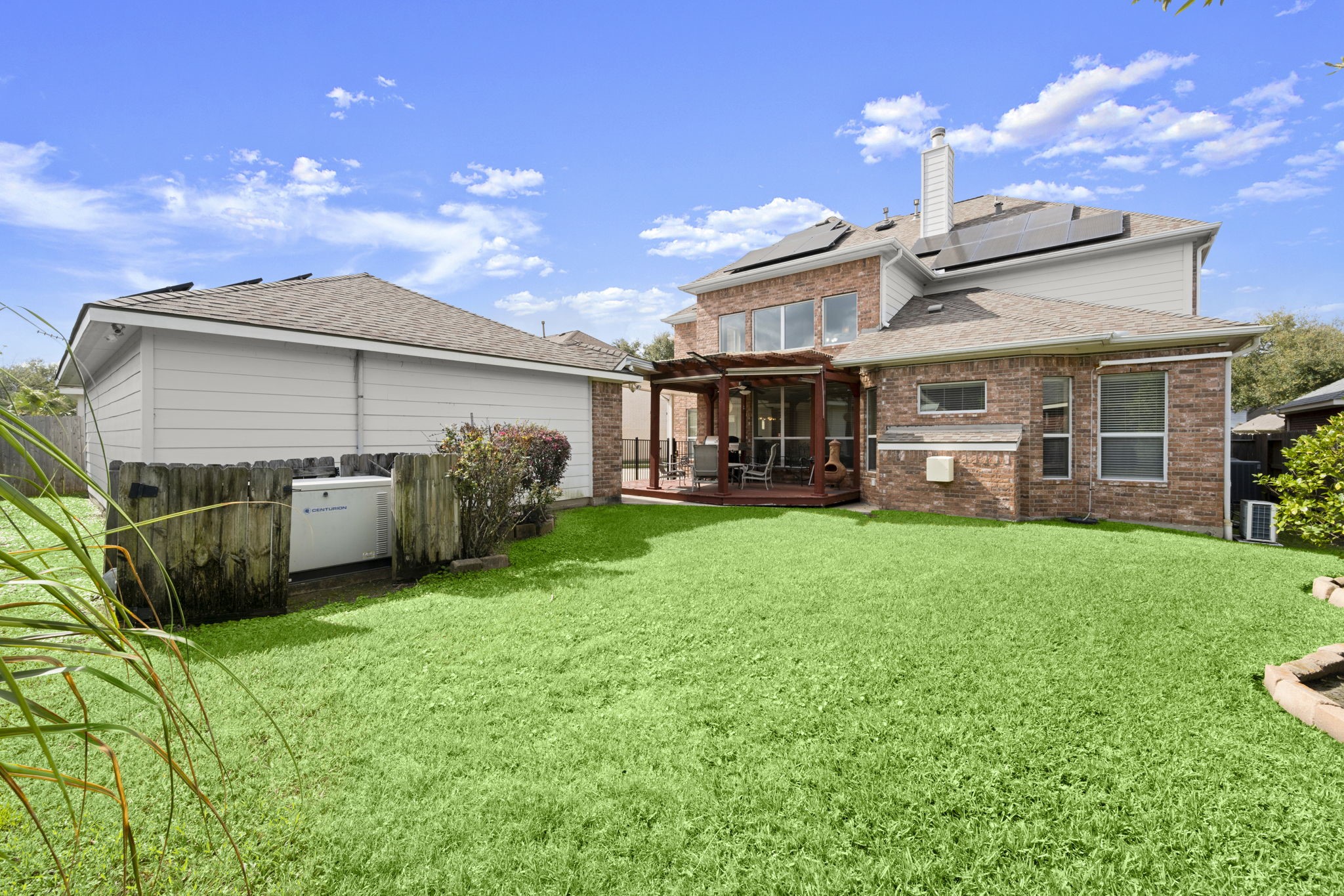 6315 Amelia Springs Drive Spring, TX 77379 - Photo 45 of 46 a view of a house with backyard and porch